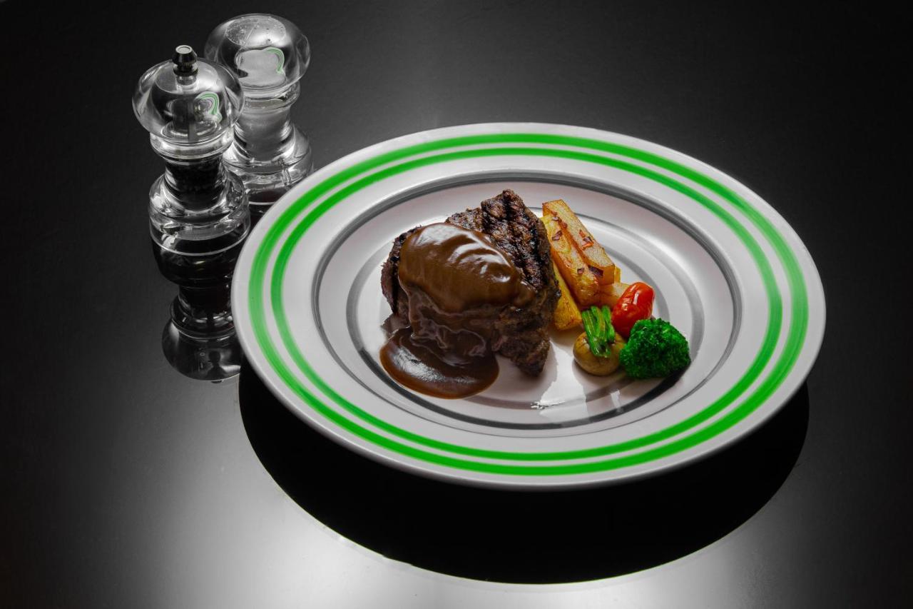奥瑞克斯亚喀巴酒店 外观 照片 A steak prepared with a steak sauce