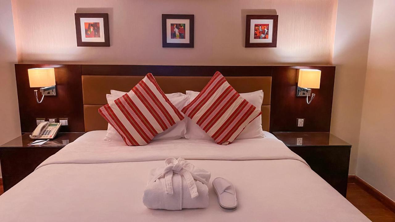奥瑞克斯亚喀巴酒店 外观 照片 A bed with a duvet